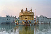 Amritsar - the Golden Temple - the Hari Mandir at the center of the the Pool of Nectar  